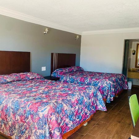 Budget Inn And Suites Crowley Екстериор снимка