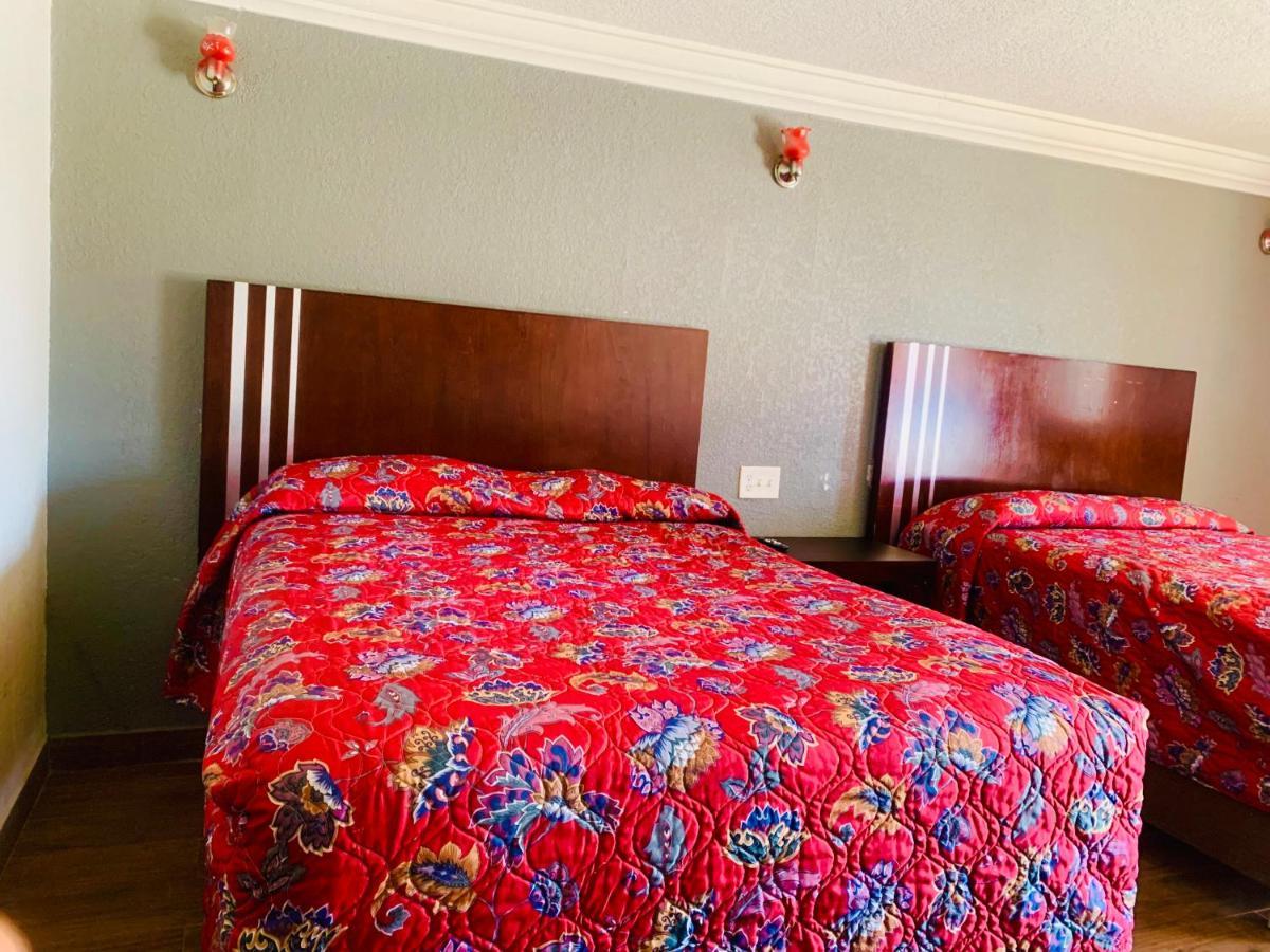 Budget Inn And Suites Crowley Екстериор снимка