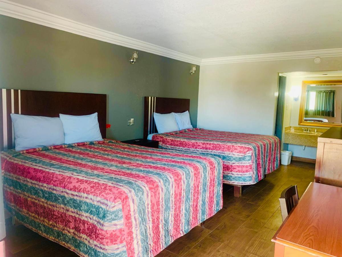 Budget Inn And Suites Crowley Екстериор снимка