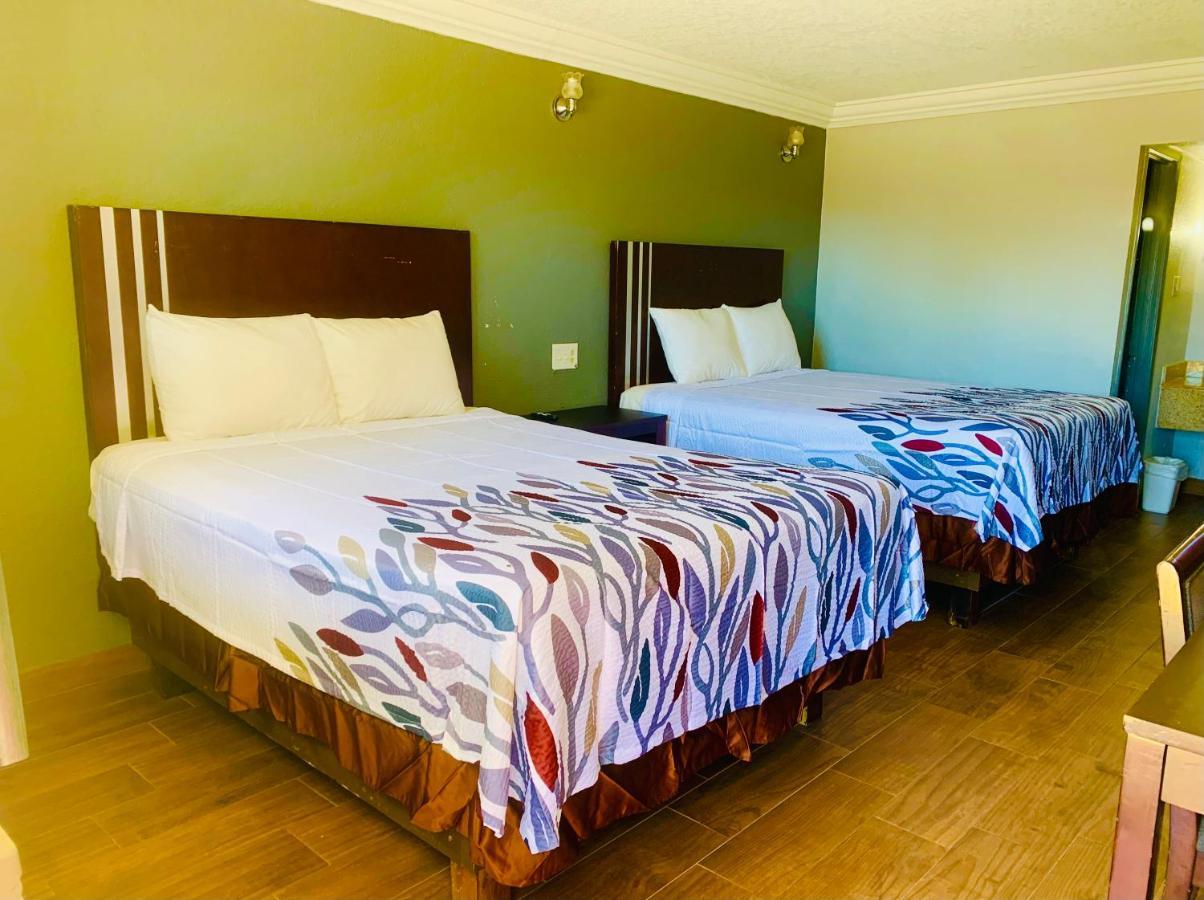Budget Inn And Suites Crowley Екстериор снимка